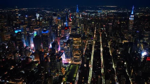 Sparkling never sleeping New York at night. Vast cityscape of metropolis from drone footage.