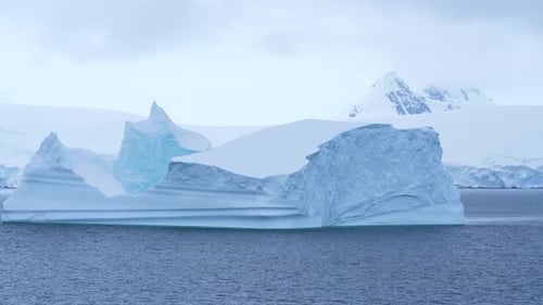 Giant Iceberg Blue and White Ice and Snow Antarctica Incredible Frozen Landscape Beautiful Scenery O
