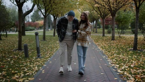 Happy Couple in Love Having Romantic Walk with Joy and Fun In