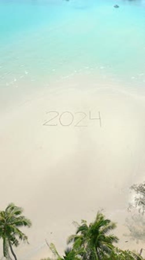 The Year 2024 Written on a Tropical Beach Concept of a Beach Getaway in 2024
