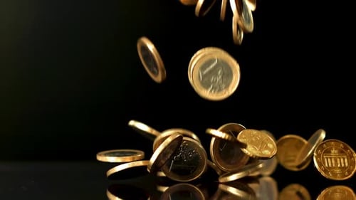 Shiny Euro Coins Falling on Black Background