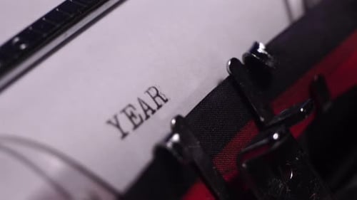 Year 1979, Typing on Blank White Paper in Vintage Typewriter, Close Up