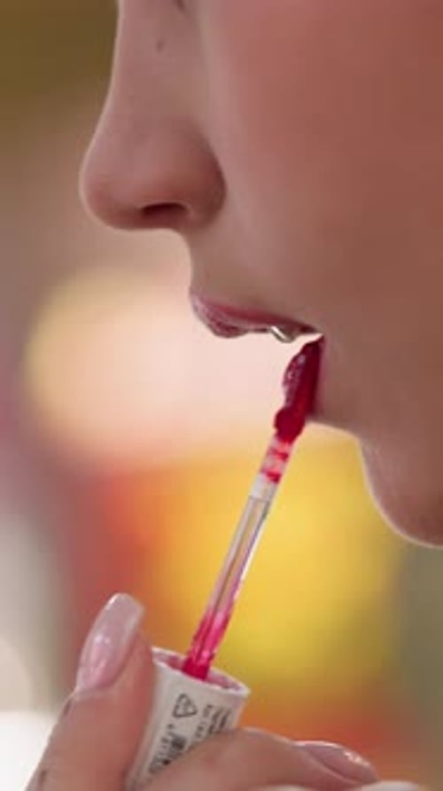 Woman Applying Red Lip Gloss, Beauty Treatment