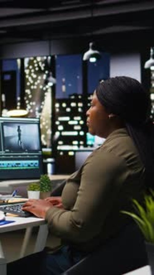 Vertical Video Professional Video Editing Team Works on Film Montage on Software in Office