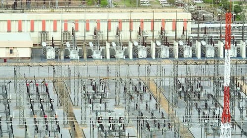 A high voltage power station from above by aerial view drone.