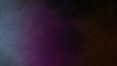 Colorful Swirling Smoke Against a Black Background