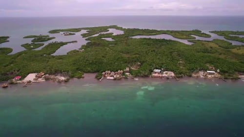 Random shape island with many lagoons in the interior. Turquoise coast sea water. Aerial