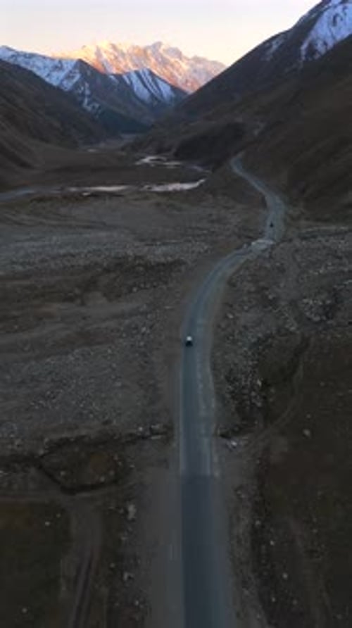 Aerial view of road through mountains, Pakistan.