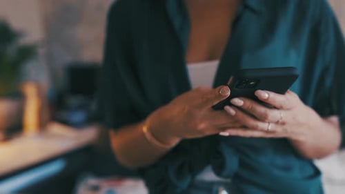 Hands, cellphone and typing online or home connection, social media or communication