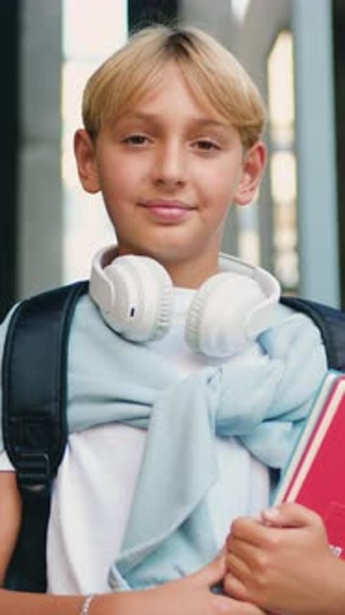 Portrait Teen Boy Standing Outside Near School Looking at Camera and Smiling Joyful Boy Before Start
