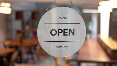 Open Sign Hanging in Cafe Window