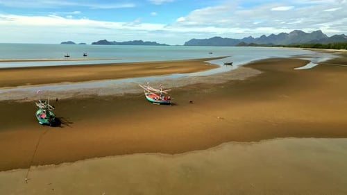 Aerial view of boats on the beach, Thailand.