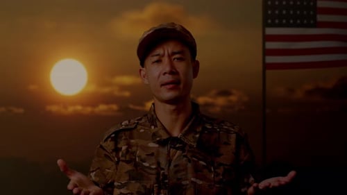 Man in Military Uniform Speaking at Sunset