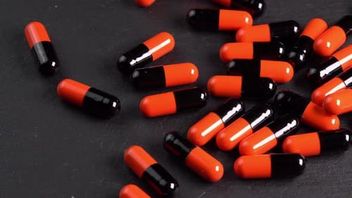 Bright Orange and Black Pills Macro Shot