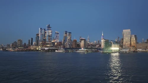 Aerial view of Midtown Manhattan and The Hudson River at night