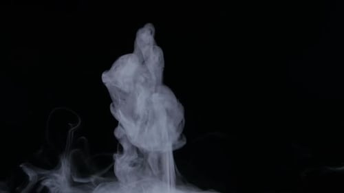 Swirling Vapor Clouds Against a Black Background