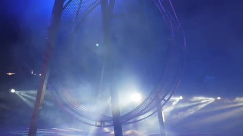 A Huge Rotating Wheel of Death on Which Acrobats Perform in the Circus
