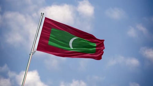 Realistic Maldives National Flag Waving in Clear Blue Sky