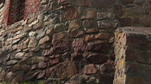 A view of a colorful and interesting stone-made wall of an old and ancient fortress korela now a mus