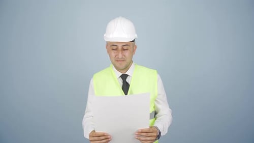 The engineer holding the project laughs.