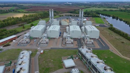 Aerial view of the power station near river, United Kingdom.