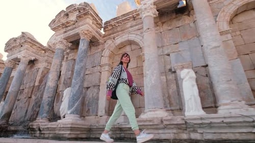 Tourist Woman Walking in the Ancient City