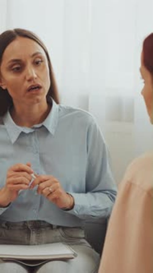 Woman Talking During Therapy Session Indoors