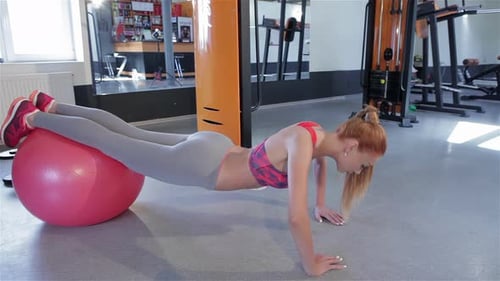 Woman Pushups at the Fitness Centre