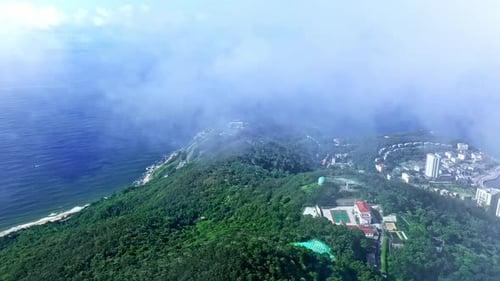 Aerial Top view of a transparent blue sea with beautiful waves at sunny day in summer. air of ocean