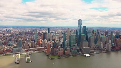 new york skyline from helicopter clody winter