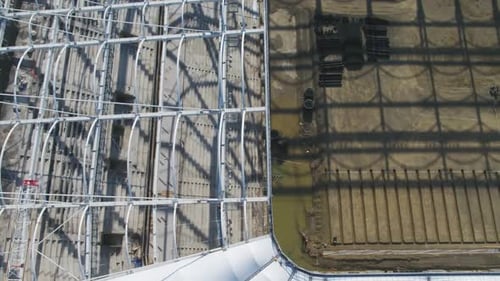 Aerial View of an Industrial Structure That is Currently Undergoing Construction Work