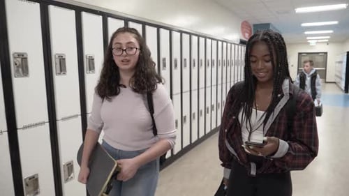 Of Students in School Corridor with Phone