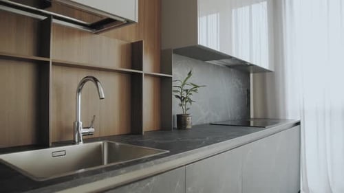 Sleek Modern Kitchen with Gray Marble Countertops