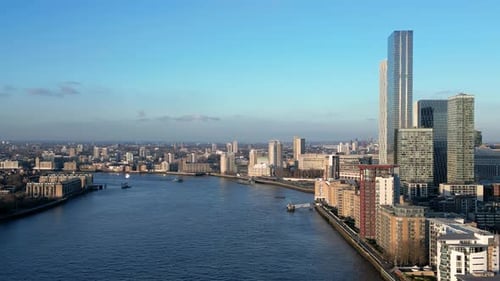 Dramatic Aerial View of Modern Skyscrapers Along the River Thames