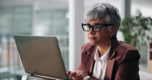 Computer, glasses and businesswoman reading in office with research for finance budget proposal