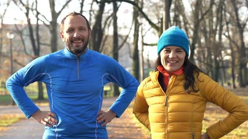 Portrait of Happy Joggers in Autumn Park, Super 120