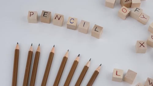 Pencils and Wooden Blocks Spelling Word Pencil