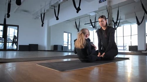 Child Working Out with Yoga Instructor