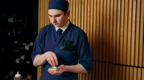 in a Japanese Restaurant Chef in Blue Prepares an Expensive Plate of Seafood