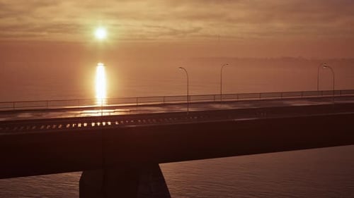 Setting Sun Over Water Bridge