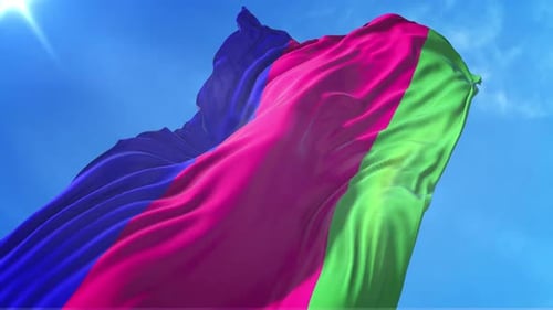 Vibrant Waving Flag Banner Against Blue Sky Seamless Loop