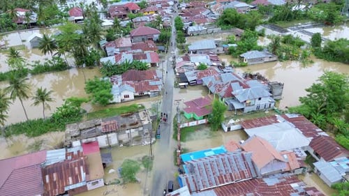 Aerial View of Flooded Village and Homes