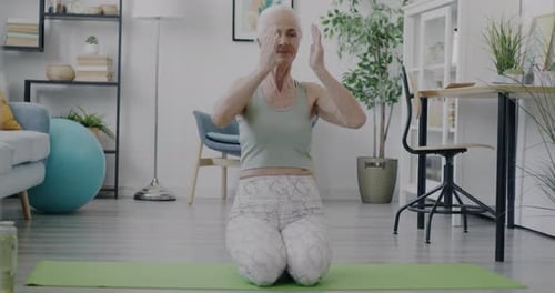 Senior Woman Practicing Yoga at Home
