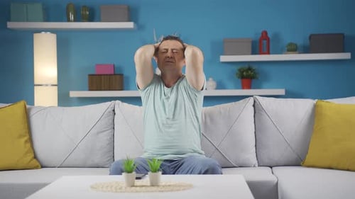 The man having a nervous breakdown is angry and does not feel well.