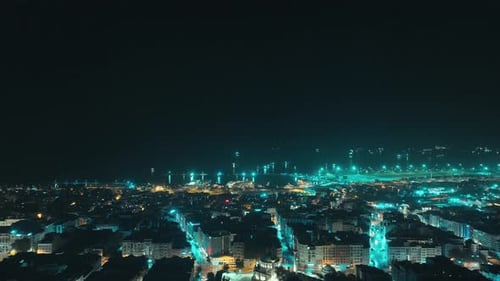 Illuminated Cityscape at Night Aerial View