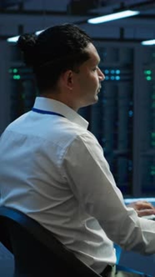 Vertical Composition Technical Colleagues Managing Server Room Infrastructure