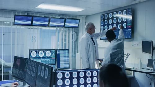 Doctors Discussing Brain Scans in a Modern Lab