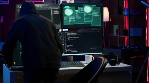 Hacker Arriving in Secret Base with Laptop Ready to Start Programming Viruses