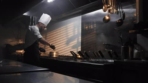Chef Preparing Dinner in a Cruise Ship Kitchen