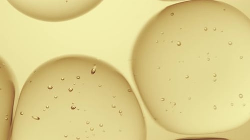 Abstract Golden Liquid Drops with Rising Bubbles Animation